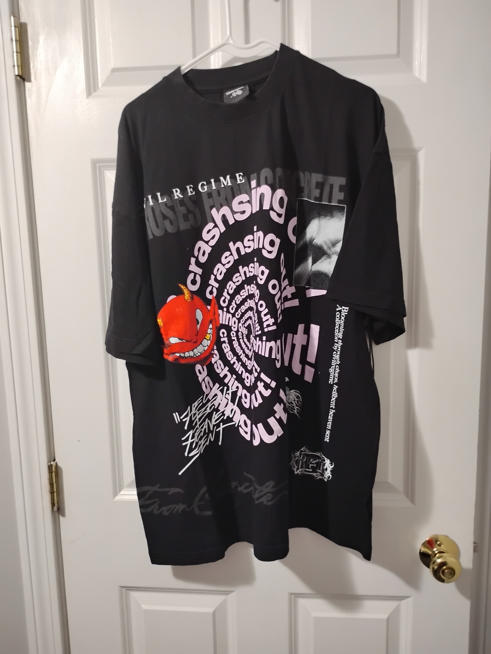 Civil Regime Men's Crashing Out  T-Shirt with Pink Spiral and Orange Accent